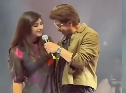 shah rukh khan surprises fan with iconic dialogue at dubai event shah rukh khan surprises fan with iconic dialogue at dubai event