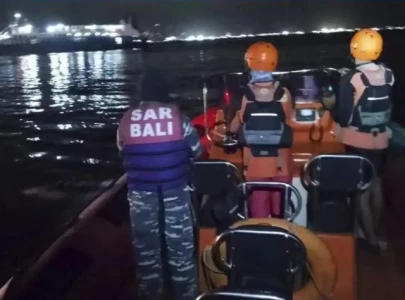 at least four dead dozens missing as ferry sinks off bali