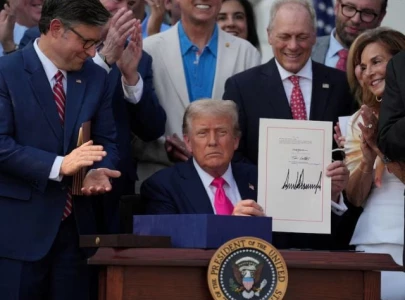 trump signs sweeping tax spending cuts into law on fourth of july