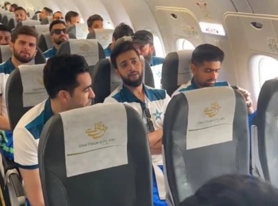 video of babar imad sitting together in plane goes viral