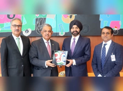 pakistan s ambassador to us gifts trionda football to world bank president