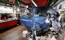 two dead 18 injured as truck rams through crowded market in south korea