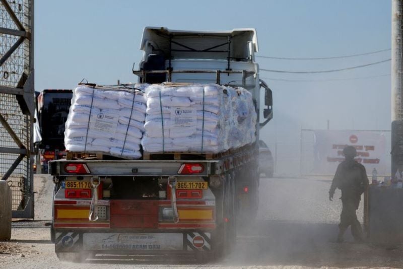 a truck carries humanitarian aid destined for the gaza strip amid the ongoing conflict in gaza between israel and hamas at the kerem shalom crossing in southern israel november 11 2024 photo reuters