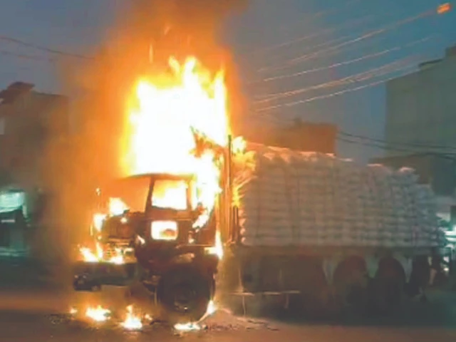 people protesting against fatal accidents caused by heavy vehicles set a truck on fire in the korangi area photo ppi people protesting against fatal accidents caused by heavy vehicles set a truck on fire in the korangi area photo ppi