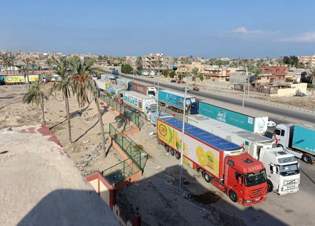 trucks carrying humanitarian aid as they wait for the re opening of the rafah border crossing to enter gaza in the city of al arish sinai peninsula egypt october 16 2023 photo reuters trucks carrying humanitarian aid as they wait for the re opening of the rafah border crossing to enter gaza in the city of al arish sinai peninsula egypt october 16 2023 photo reuters