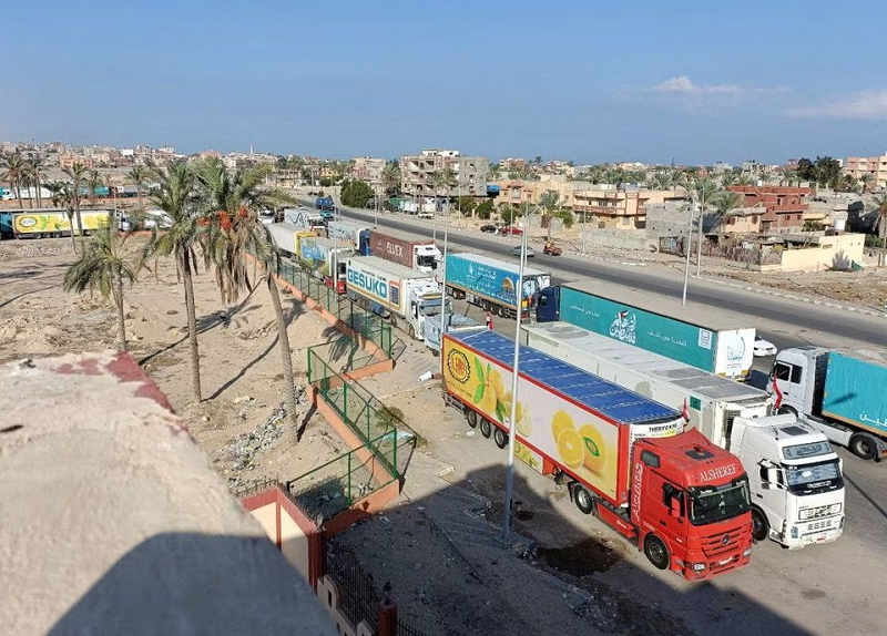 trucks carrying humanitarian aid as they wait for the re opening of the rafah border crossing to enter gaza in the city of al arish sinai peninsula egypt october 16 2023 photo reuters