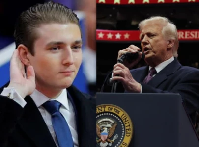 trump praises very tall son barron trump at inauguration event with crowd cheering moment
