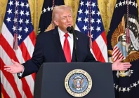 us president donald trump gestures as he speaks during a women s month history event in the east room of the white house in washington dc on march 12 2026 photo afp