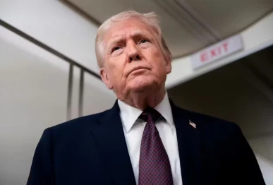 u s president donald trump speaks with members of the media aboard air force one en route from florida to joint base andrews maryland u s january 11 2026 photo reuters