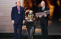 us president donald trump looks on as he receives the fifa peace prize from fifa president gianni infantino during the draw for the 2026 fifa football world cup taking place in the us canada and mexico at the kennedy center in washington dc on december 5 2025 photo afp