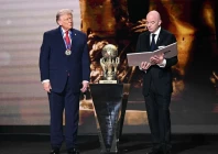 us president donald trump looks on as he receives the fifa peace prize from fifa president gianni infantino during the draw for the 2026 fifa football world cup taking place in the us canada and mexico at the kennedy center in washington dc on december 5 2025 photo afp