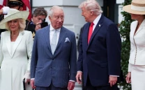 trump greets king charles on beautiful british day at white house