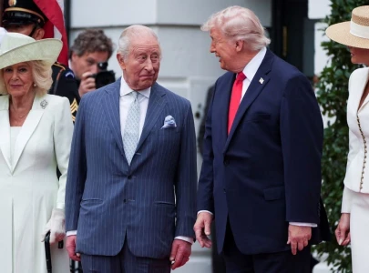 trump greets king charles on beautiful british day at white house