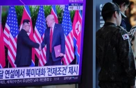 a south korean soldier stands next to a tv broadcasting a news report on a possible summit between north korean leader kim jong un and us president donald trump at a railway station in seoul south korea october 22 2025 photo reuters