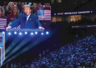attendees watch as us president donald trump speaks during the republican national midterm convention at the american airlines center in dallas photo afp attendees watch as us president donald trump speaks during the republican national midterm convention at the american airlines center in dallas photo afp