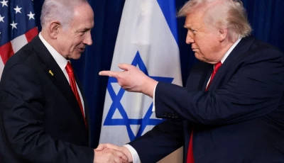 us president donald trump points his finger towards israeli prime minister benjamin netanyahu as they shake hands during a press conference after meeting at trump s mar a lago club in palm beach florida us december 29 2025 reuters