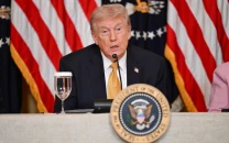 trump says over 7 000 targets hit as iran warns of taking aim at us industries in region