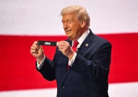 us president donald trump shows the card reading usa during the draw for the 2026 fifa football world cup taking place in the us canada and mexico at the kennedy center in washington dc on december 5 2025 photo afp
