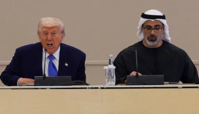us president donald trump speaks next to crown prince of abu dhabi sheikh khaled bin mohamed bin zayed al nahyan during roundtable discussion at a business forum at qasr al watan during the final stop of his gulf visit in abu dhabi united arab emirates may 16 2025 photo reuters