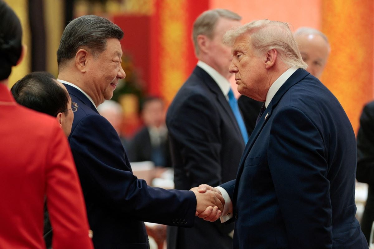 Chinese President Xi Jinping and US President Donald Trump shake hands at a state banquet at the Great Hall of the People in Beijing, China, May 14, 2026. REUTERS