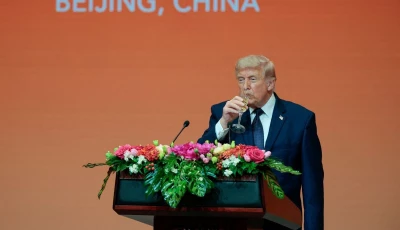 us president donald trump takes a sip of a drink as he speaks at a state banquet with chinese president xi jinping not pictured at the great hall of the people in beijing china may 14 2026