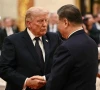 china s president xi jinping r and us president donald trump shake hands as they attend a state banquet at the great hall of the people in beijing on may 14 2026 photo afp
