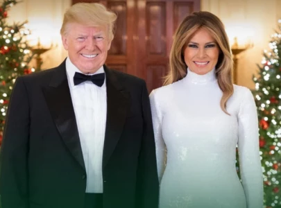 trump recycles old christmas photo for peaceful message while promoting maga holiday merchandise