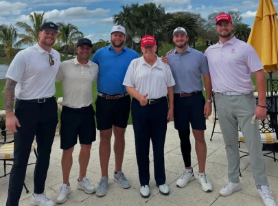 donald trump golfs with buffalo bills players on presidents day