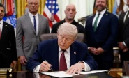 us president donald trump signs an executive order encouraging more research into ibogaine next to u s health and human services hhs secretary robert f kennedy jr joe rogan and americans for ibogaine ceo w bryan hubbard in the oval office of the white house in washington d c april 18 2026 reuters