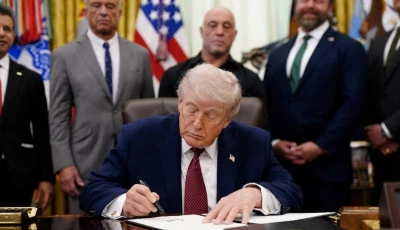 us president donald trump signs an executive order encouraging more research into ibogaine next to u s health and human services hhs secretary robert f kennedy jr joe rogan and americans for ibogaine ceo w bryan hubbard in the oval office of the white house in washington d c april 18 2026 reuters