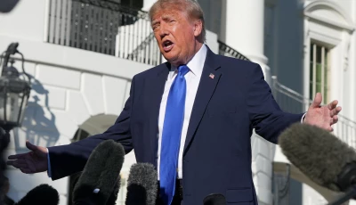us president donald trump speaks to members of the media as he departs the white house en route to iowa in washington dc us october 22 2026 photo reuters