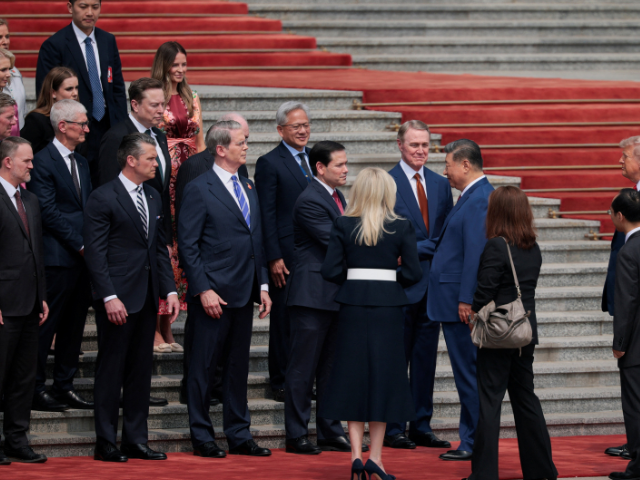 Chinese President Xi Jinping shakes hands with U.S. Secretary of State Marco Rubio while he stands alongside U.S. Ambassador to China David Perdue, U.S. Secretary of the Treasury Scott Bessent, Jensen Huang, Founder, President and CEO of Nvidia, U.S. Secretary of Defense Pete Hegseth, U.S. Trade Representative Jamieson Greer and Apple CEO Tim Cook during a welcoming ceremony for U.S. President Donald Trump at the Great Hall of the People in Beijing. PHOTO: REUTERS