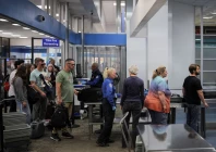 travelers pass through a transportation security administration tsa security screening at hollywood burbank airport during the first day of a partial us government shutdown in burbank california u s october 1 2025 photo reuters travelers pass through a transportation security administration tsa security screening at hollywood burbank airport during the first day of a partial us government shutdown in burbank california u s october 1 2025 photo reuters