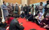 opposition sit in enters day two vows to continue until imran shifted for eye care