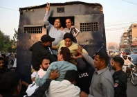 policemen detain pakistan tehreek e insaf supporters during a protest against the 27th constitutional amendment in karachi on november 21 2025 photo afp