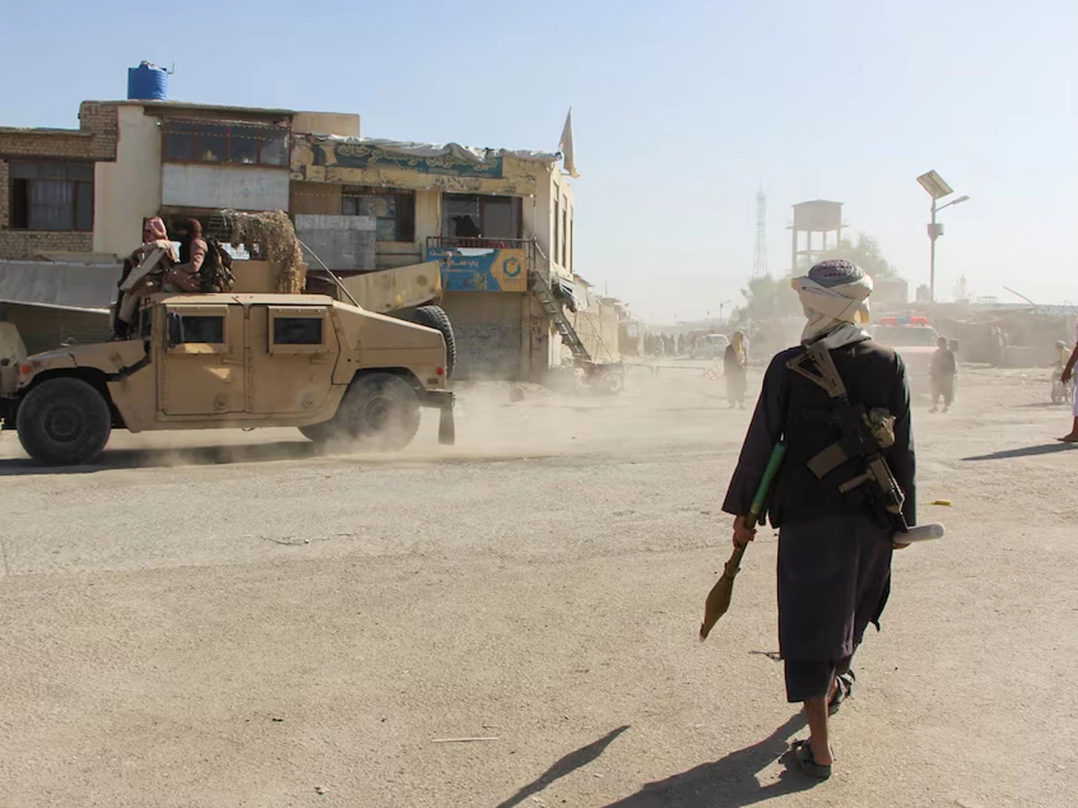 afghan taliban patrol near the afghanistan pakistan border in spin boldak kandahar province on october 15 2025 photo reuters file