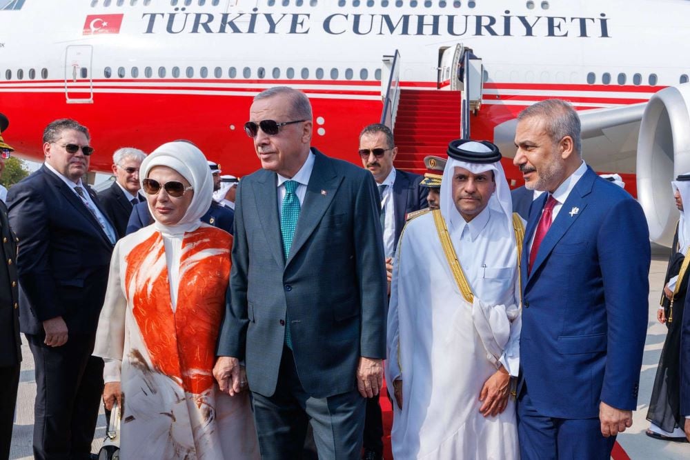 This handout picture released by the Qatar News Agency (QNA) shows Qatar's Deputy Prime Minister and Minister of State for Defence Affairs Sheikh Saud bin Abdulrahman al-Thani (2nd R) receiving Turkey's President Recep Tayyip Erdogan, his wife Emine Erdogan (L),  and Foreign Minister Hakan Fidan (R) upon their arrival in Doha ahead of an Arab Islamic summit on September 15, 2025.PHOTO: AFP