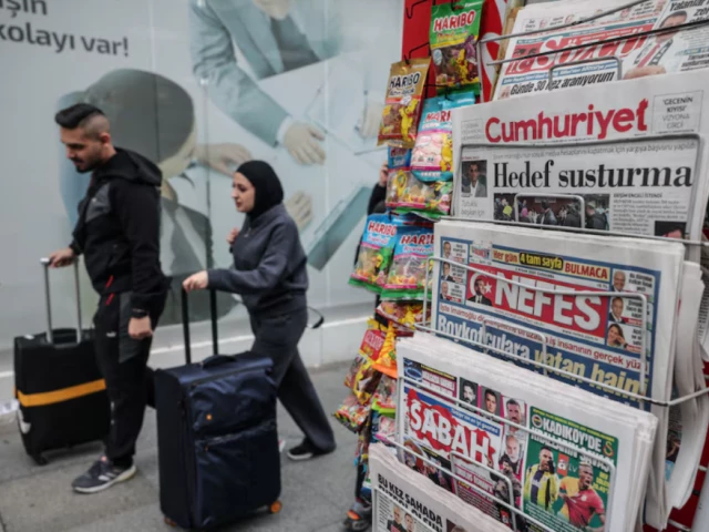 people walk by newsstand amid the opposition s calls for a mass economic boycott following the arrest of istanbul mayor ekrem imamoglu that sparked nationwide protests in istanbul turkey april 2 2025 photo reuters people walk by newsstand amid the opposition s calls for a mass economic boycott following the arrest of istanbul mayor ekrem imamoglu that sparked nationwide protests in istanbul turkey april 2 2025 photo reuters