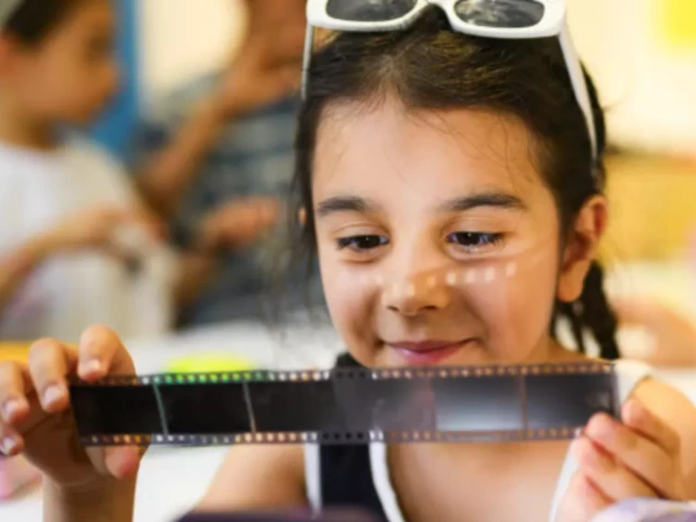 eight year old zeynep observes a roll of film during a workshop organized as part of the fotohane darkroom project in mardin southeastern turkey on june 13 2026 yasin akgul afp eight year old zeynep observes a roll of film during a workshop organized as part of the fotohane darkroom project in mardin southeastern turkey on june 13 2026 yasin akgul afp
