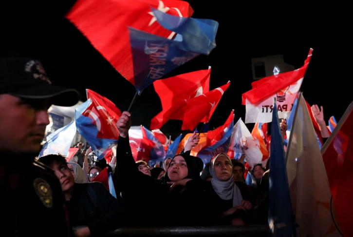 supporters of turkish president recep tayyip erdogan and ak party akp react after early exit polls at the ak party headquarters in ankara turkey may 14 2023 reuters umit bektas