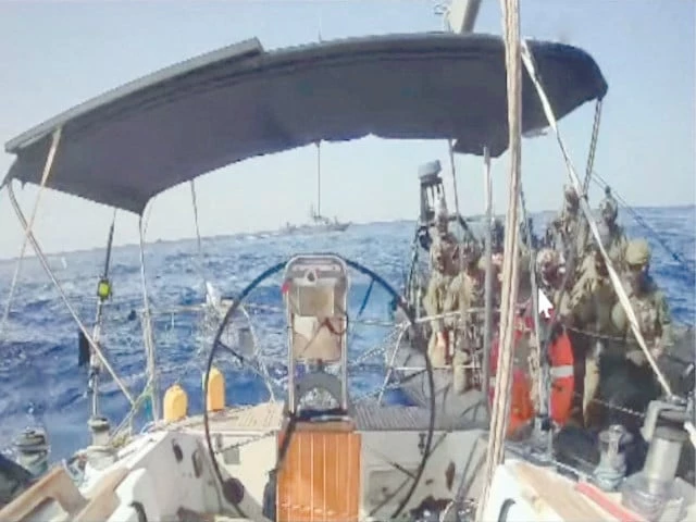 israeli navy forces approach the vessel the marinette believed to be the only ship from the global sumud flotilla still sailing towards gaza which flotilla organisers report has now been intercepted photo reuters