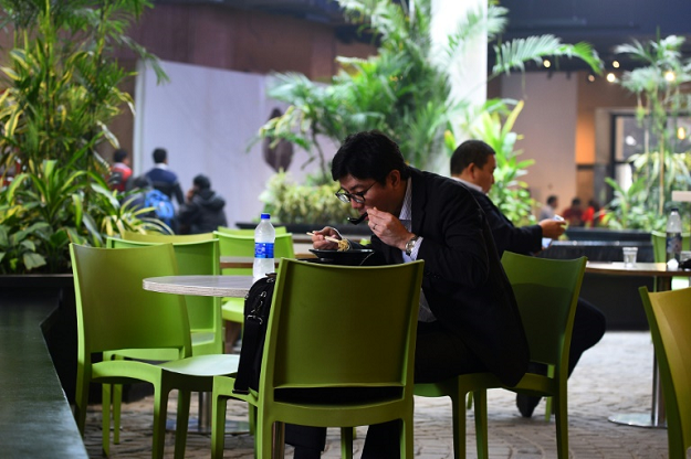 Delhi's eco-eateries, offering cleaner air as well as modern menus to the well heeled are beyond reach for the poor, who have little means of escaping the deadly smog which coats the city for much of the year. PHOTO: AFP