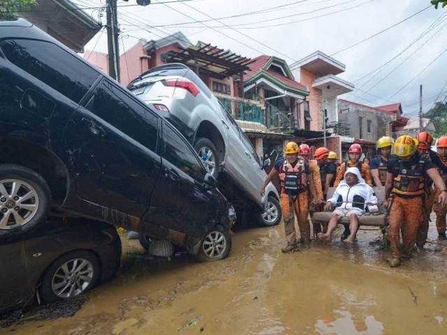 the typhoon has impacted 946 660 families or around 3 3 million people across the country photo afp the typhoon has impacted 946 660 families or around 3 3 million people across the country photo afp
