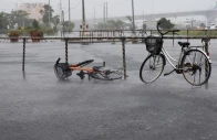 a bicycle falls on the ground in the heavy rain as typhoon bavi approaches in ishigaki japan july 10 2026 reuters