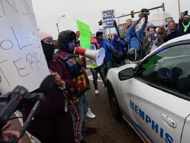 people protest next to a police car after the release of the body cam footage showing police officers beating tyre nichols the young black man who died three days after he was pulled over while driving during a traffic stop by memphis police officers in downtown memphis tennessee u s january 28 2023 photo reuters people protest next to a police car after the release of the body cam footage showing police officers beating tyre nichols the young black man who died three days after he was pulled over while driving during a traffic stop by memphis police officers in downtown memphis tennessee u s january 28 2023 photo reuters