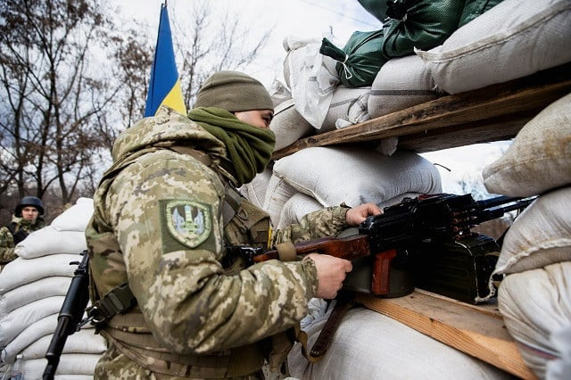 a ukrainian service member is seen at a check point in the city of zhytomyr photo reuters a ukrainian service member is seen at a check point in the city of zhytomyr photo reuters