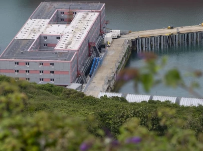 uk to end housing asylum seekers in floating prison by january