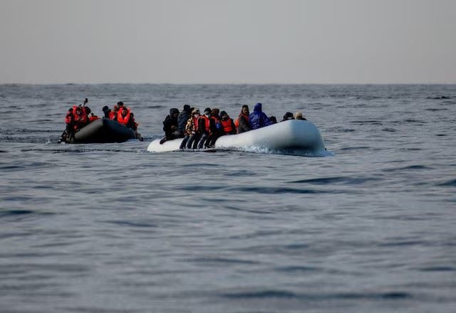two inflatable dinghies carrying migrants make their way towards england in the english channel britain may 4 2024 reuters two inflatable dinghies carrying migrants make their way towards england in the english channel britain may 4 2024 reuters