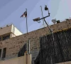 the british diplomatic flag flutters outside the british consulate in jerusalem on october 8 2026 the israeli foreign minister said that the british consulate in jerusalem ended its functions on october 8 but that seven diplomats would be allowed to remain in a limited capacity photo afp