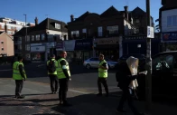an orthodox jewish man walks past security patrolling the street near where a man was arrested on wednesday following a stabbing incident in which two jewish men were wounded in the golders green area in london britain april 30 2026 photo reuters